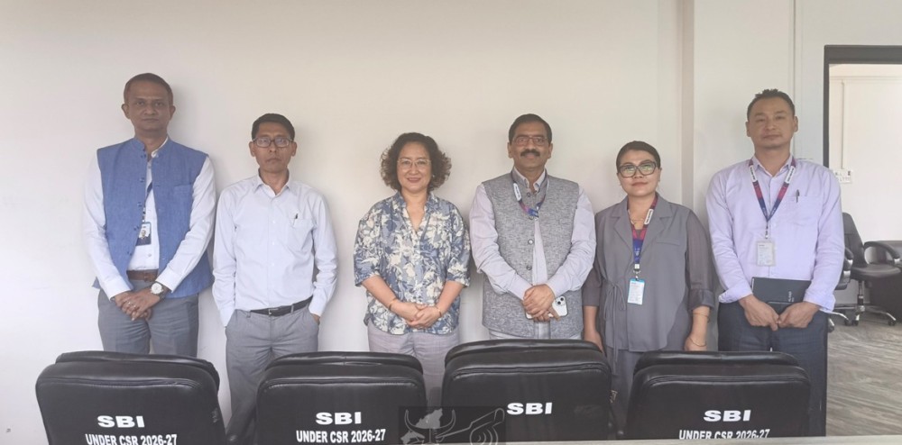 Director, Municipal Affairs, Temjenrenla Kechu, with DGM (B&O) SBI Jorhat, Narendra Pratap Singh and other officials after handing of the executive office chairs to Municipal Affairs Department, Kohima on August 20. (DIPR Photo)
